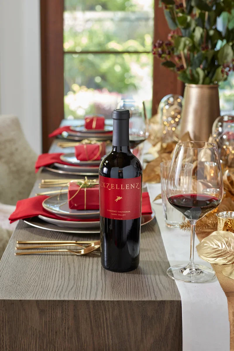2021 HALL Exzellenz Cabernet Sauvignon on elegantly set dining table for dinner party
