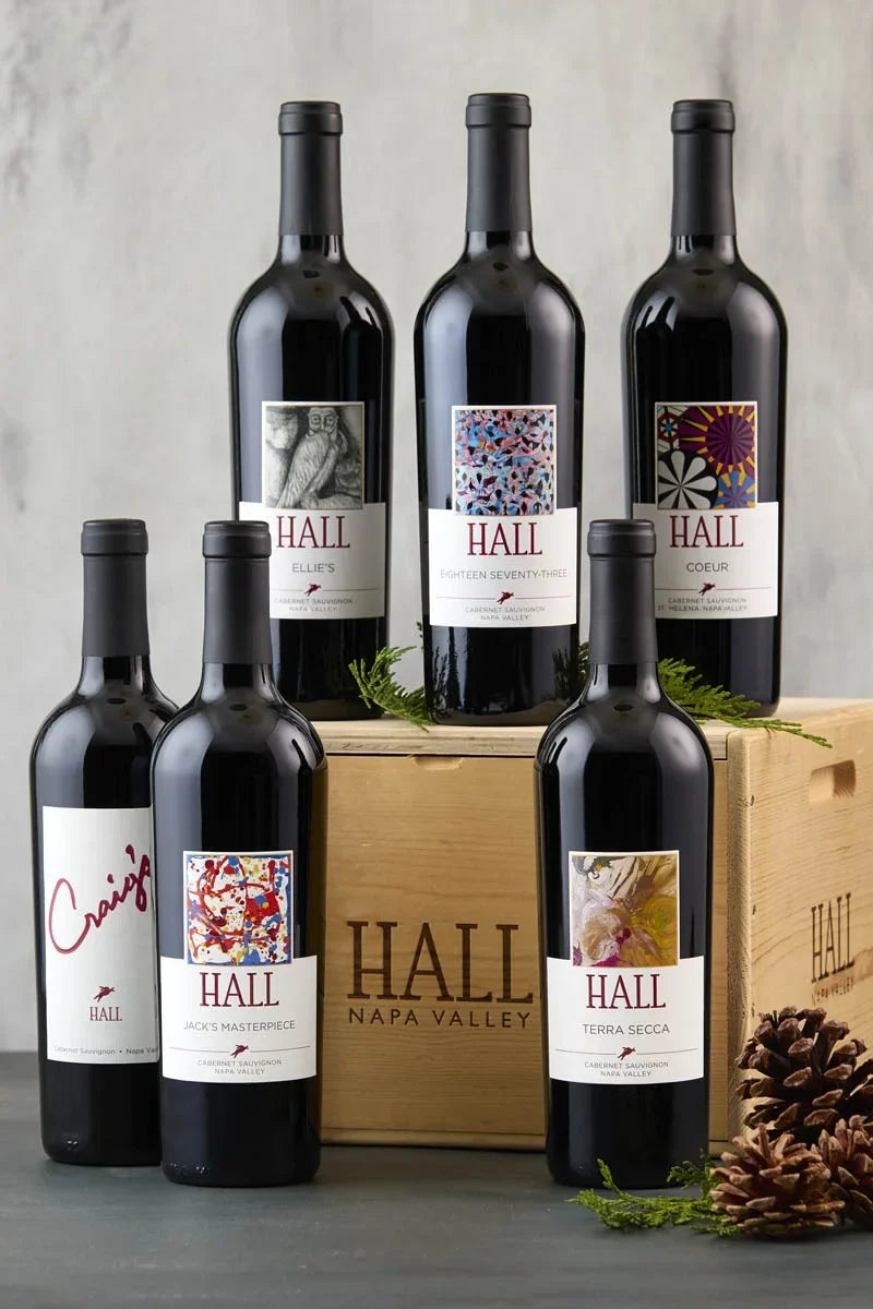 Image of the HALL Essential Cabernet Holiday Set featuring 6 bottles of HALL Cabernet and a wooden HALL wine box.