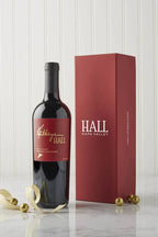 Image of the 2022 Kathryn Hall Cabernet Gift Set featuring a bottle of HALL's Kathryn Hall Cabernet and a red branded gift box.